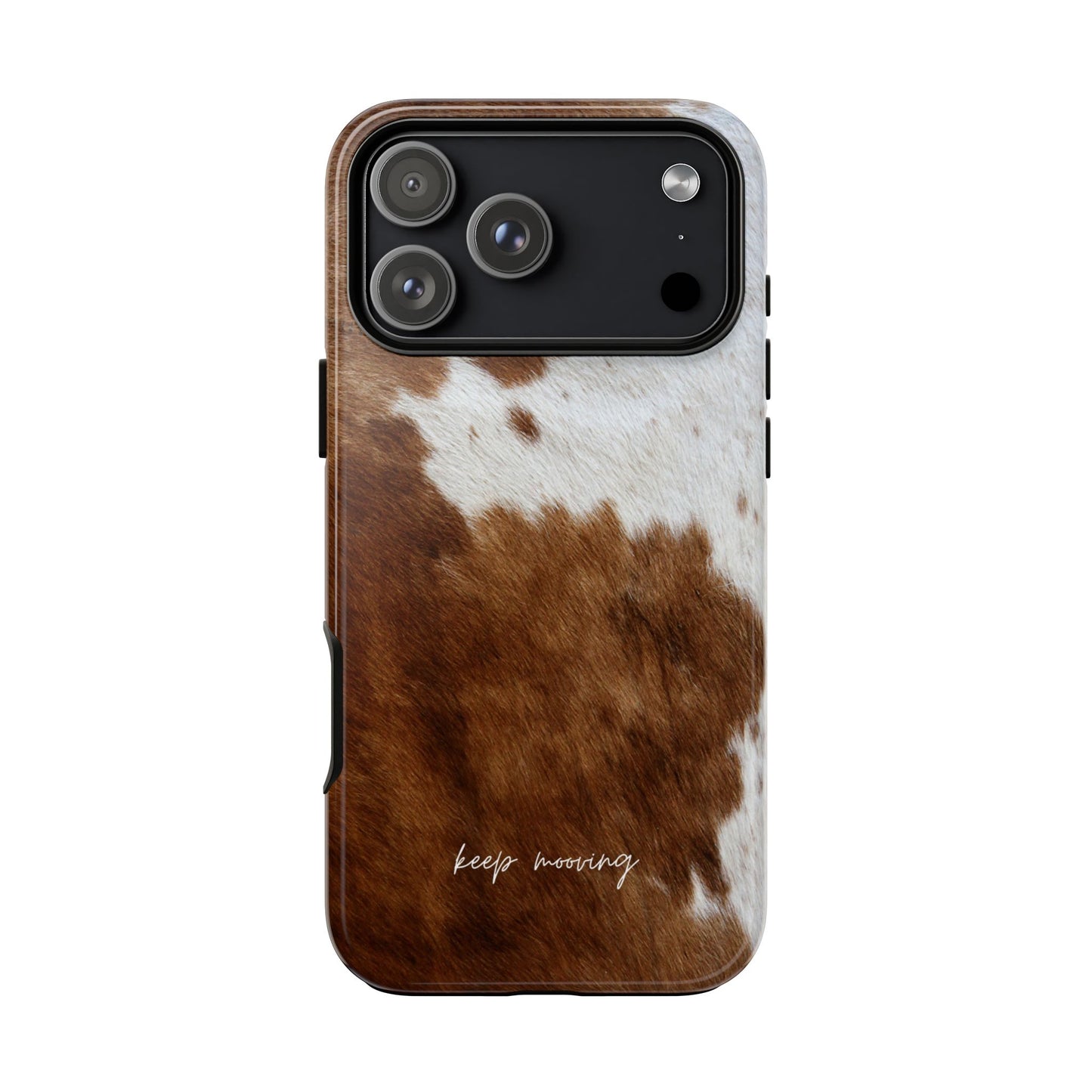 Phone case with cow print design and 'keep moving' text on a white background
