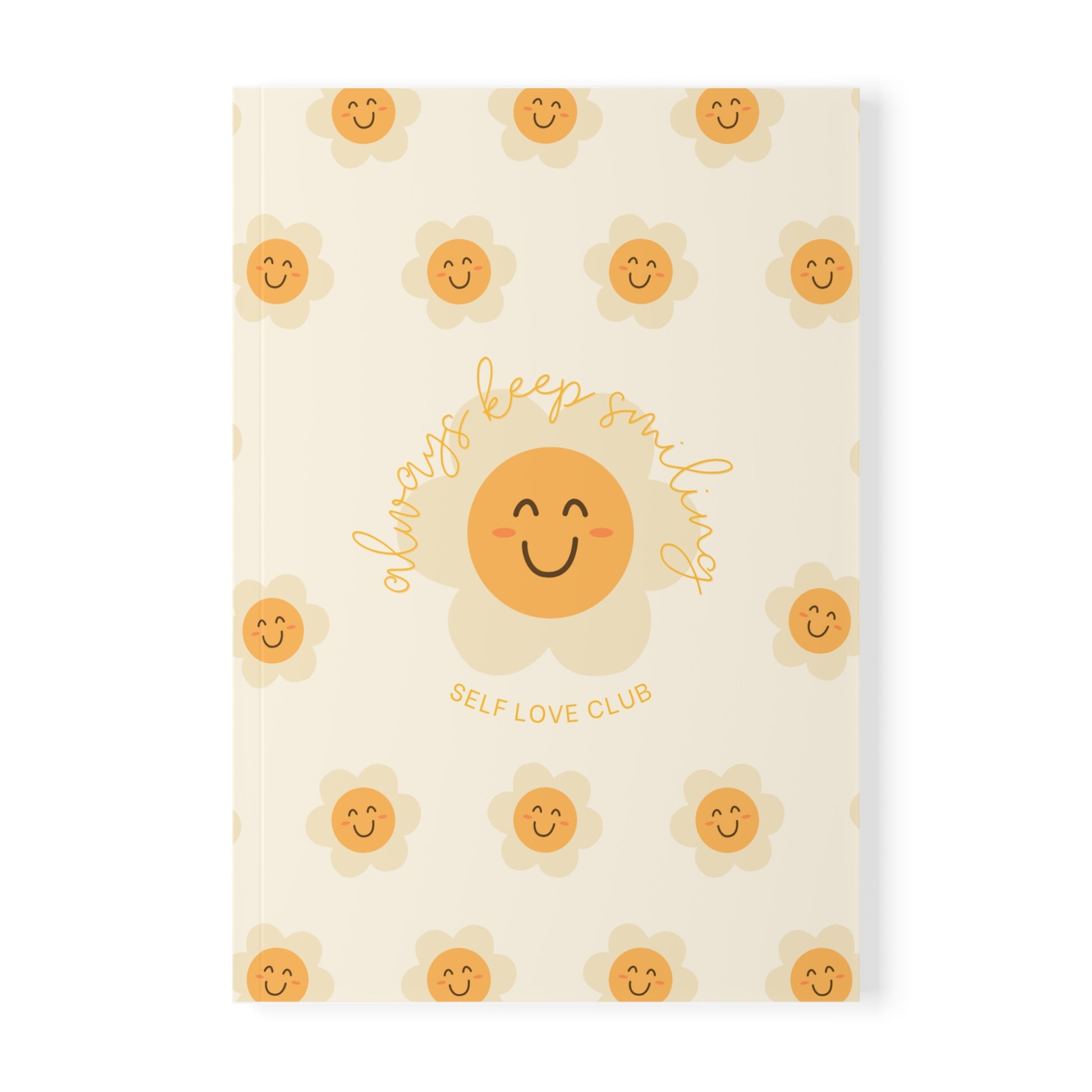 Notebook with flower and smiling face design on a white background