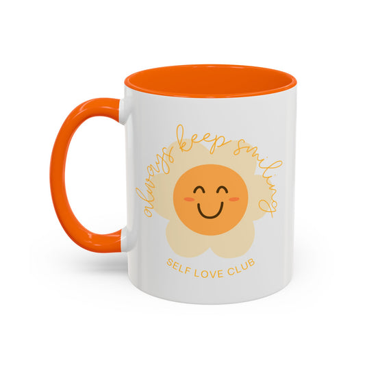 Mug with a smiling flower design and 'Self Love Club' text on a white background