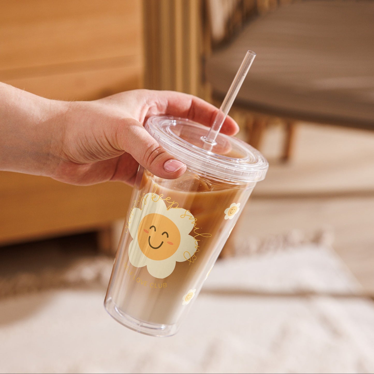 tumbler with a smiling flower graphic and the quote always keep smiling