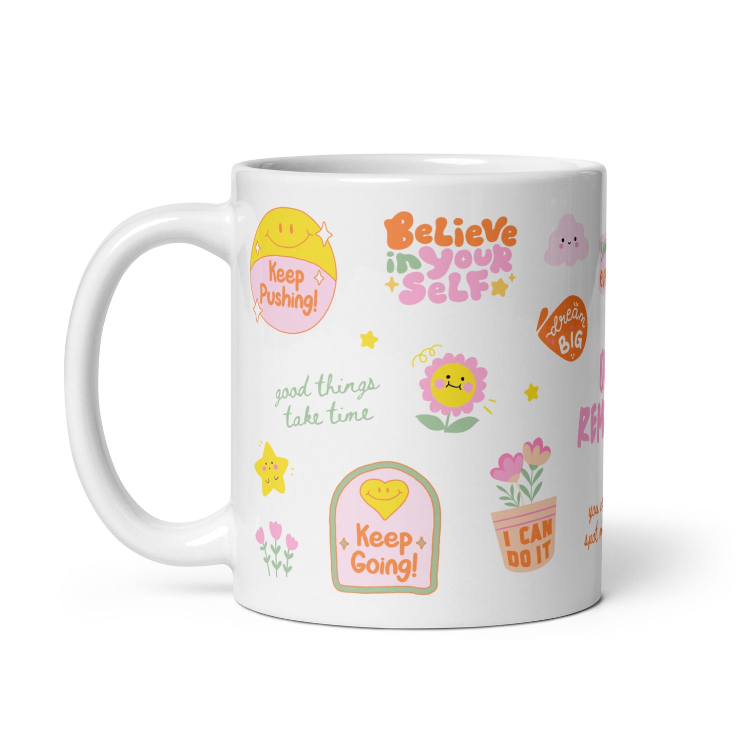 White mug with motivational stickers and phrases on a white background