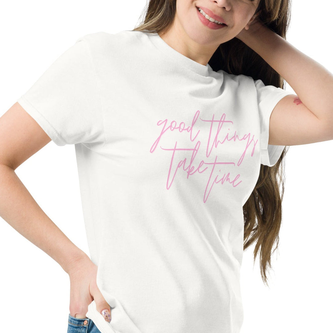 woman wearing white t-shirt with the text good things take time