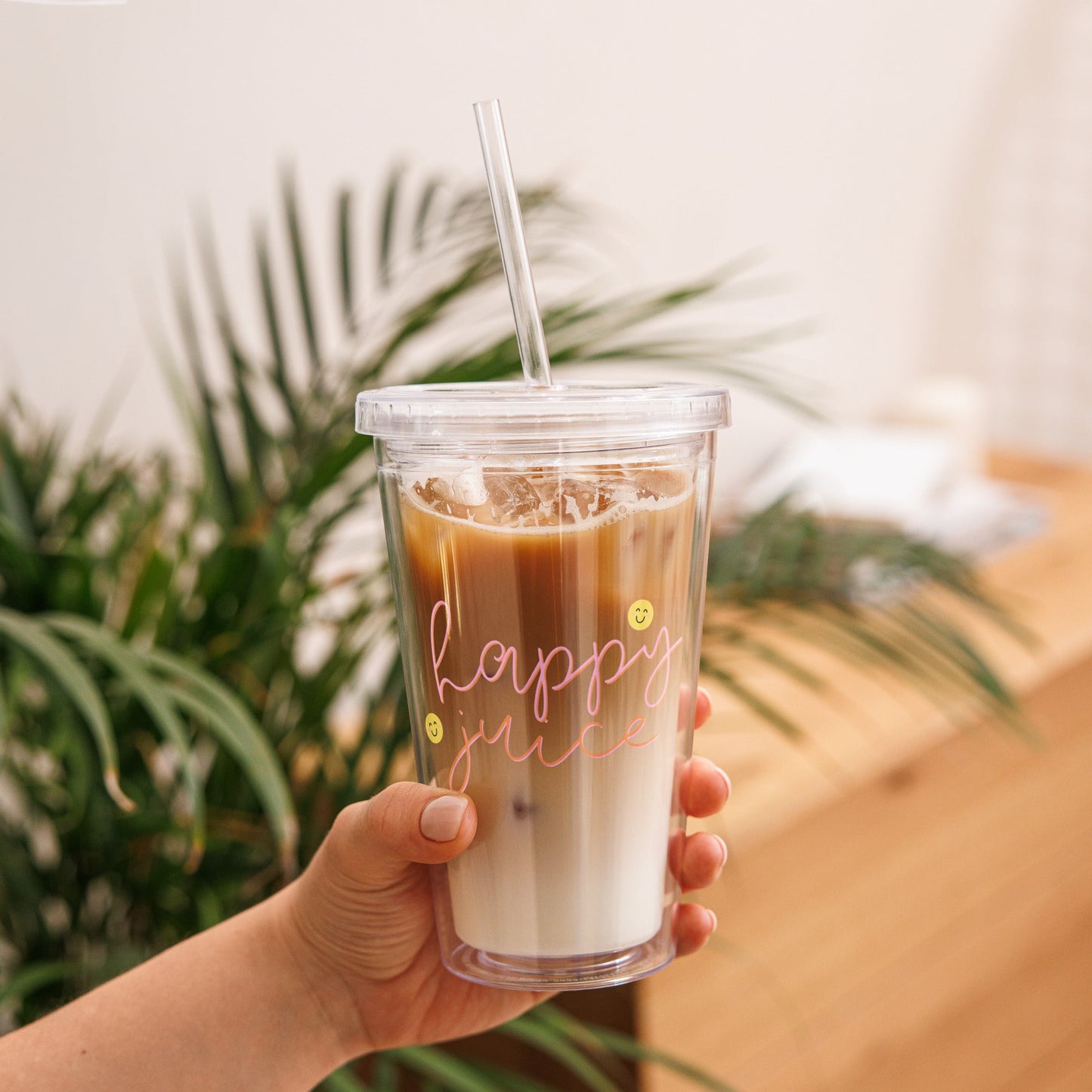 tumbler with the text happy juice