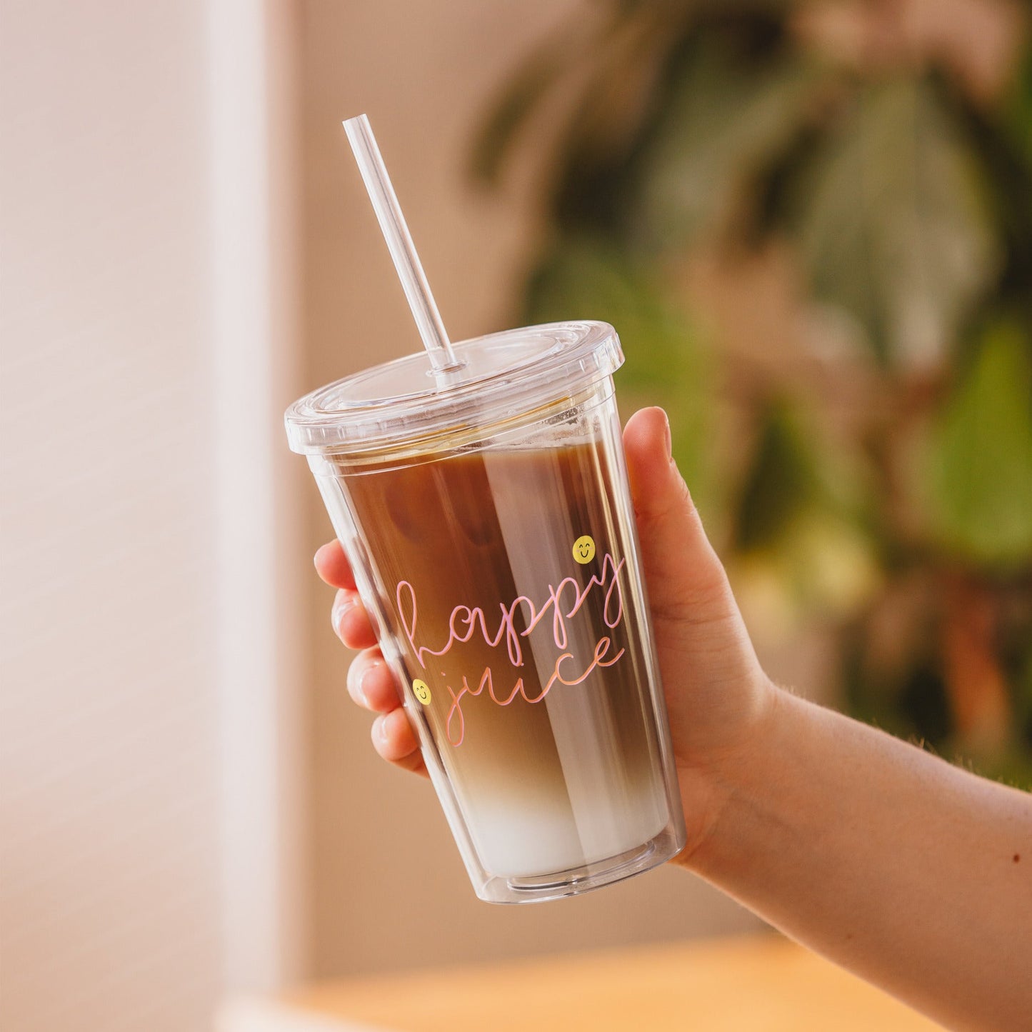 tumbler with the text happy juice